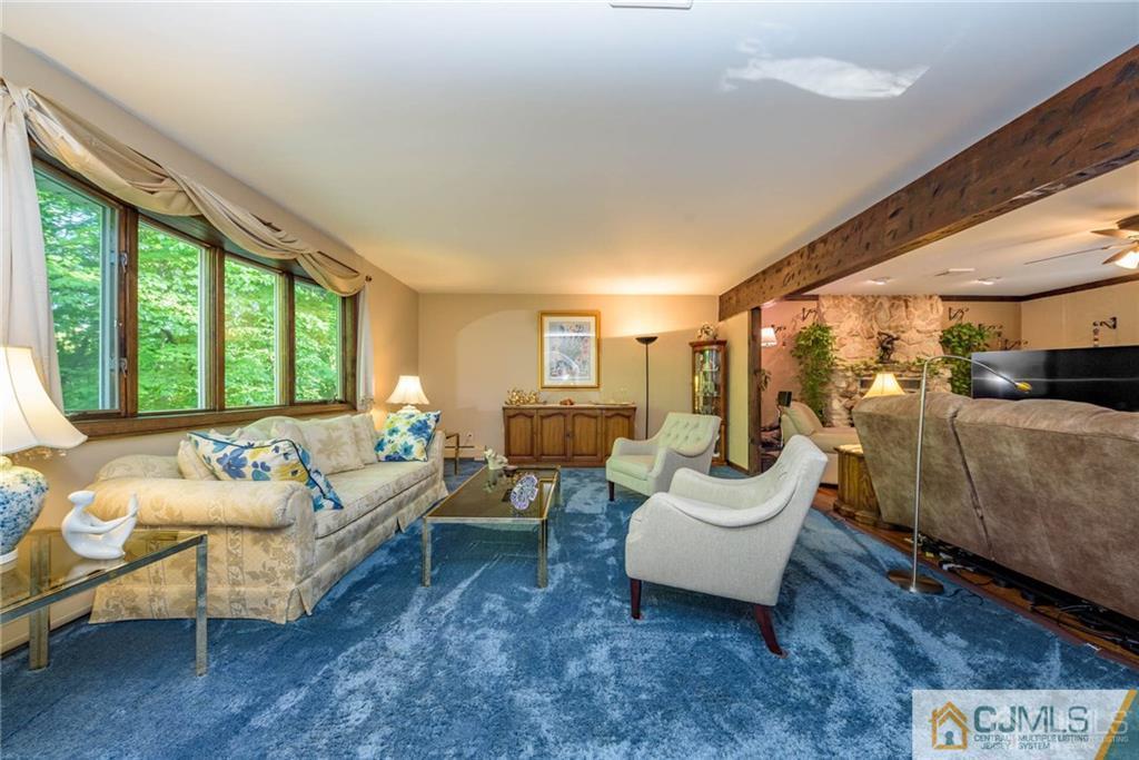4 Tower Road Pompton Lakes, NJ 07442 - Photo 3 of 25 a living room with furniture and a large window