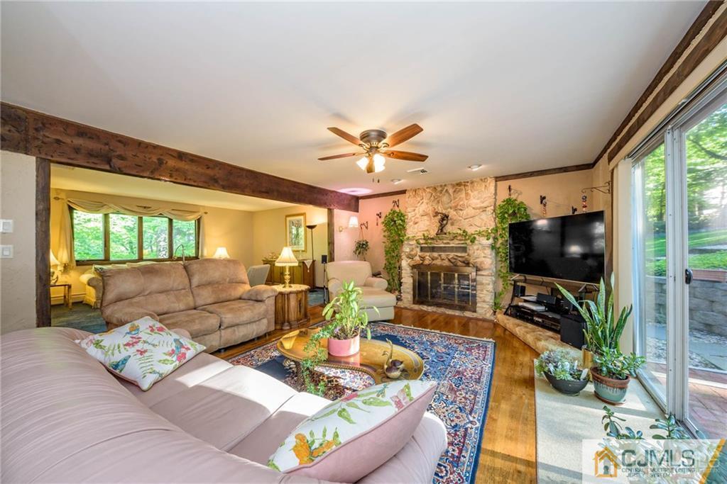 4 Tower Road Pompton Lakes, NJ 07442 - Photo 5 of 25 a living room with furniture and a large window