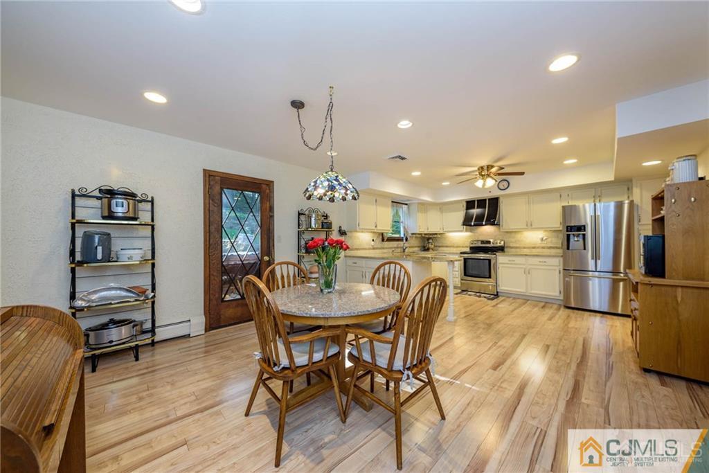 4 Tower Road Pompton Lakes, NJ 07442 - Photo 10 of 25 a view of a dining room with furniture and wooden floor