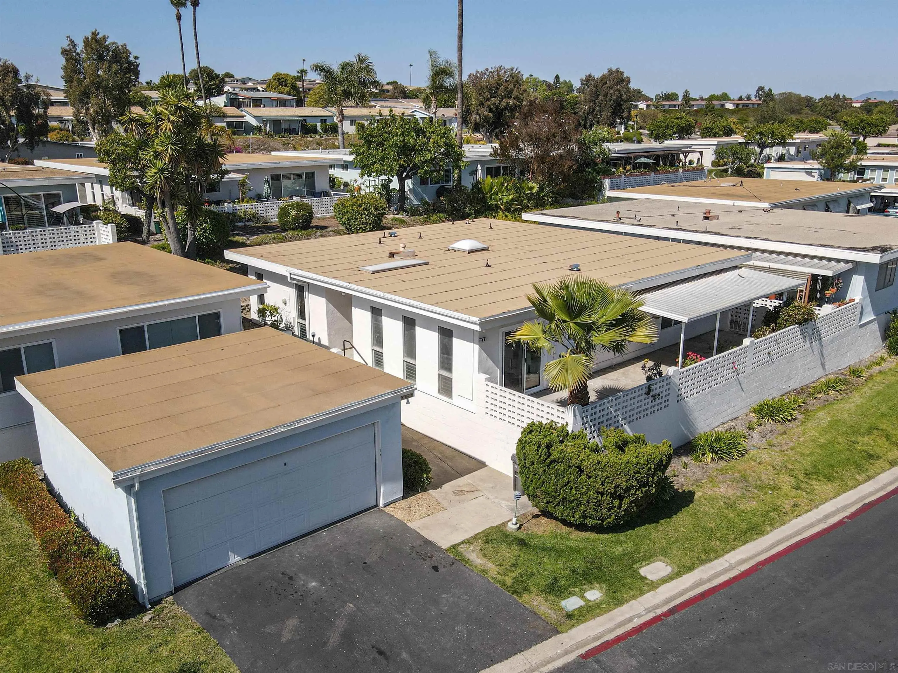 a view of a patio with couches table and chairs