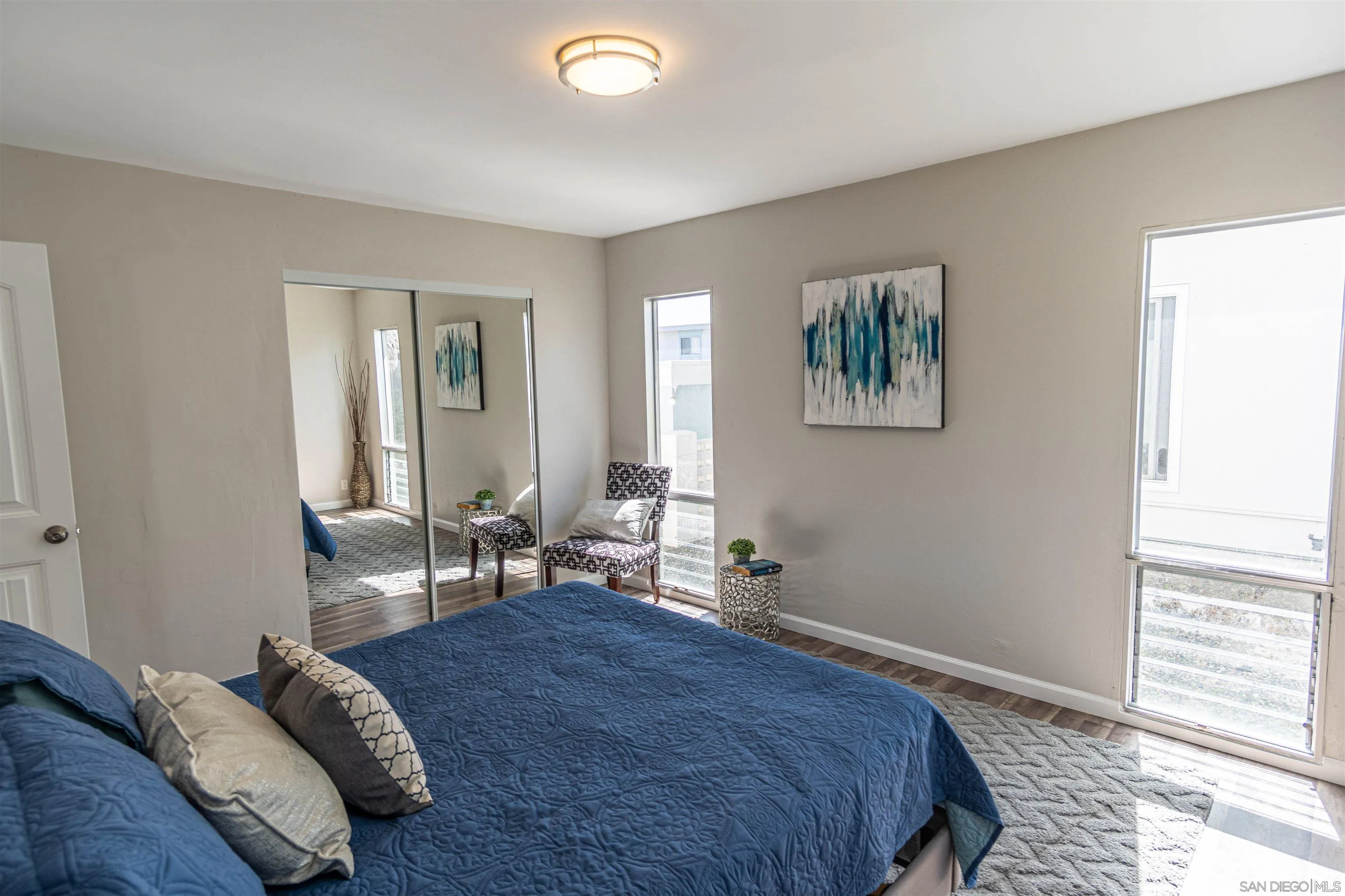 3747 Vista Campana South, Unit 43 Oceanside, CA 92057 - Photo 17 of 30 a bedroom with bed and a window