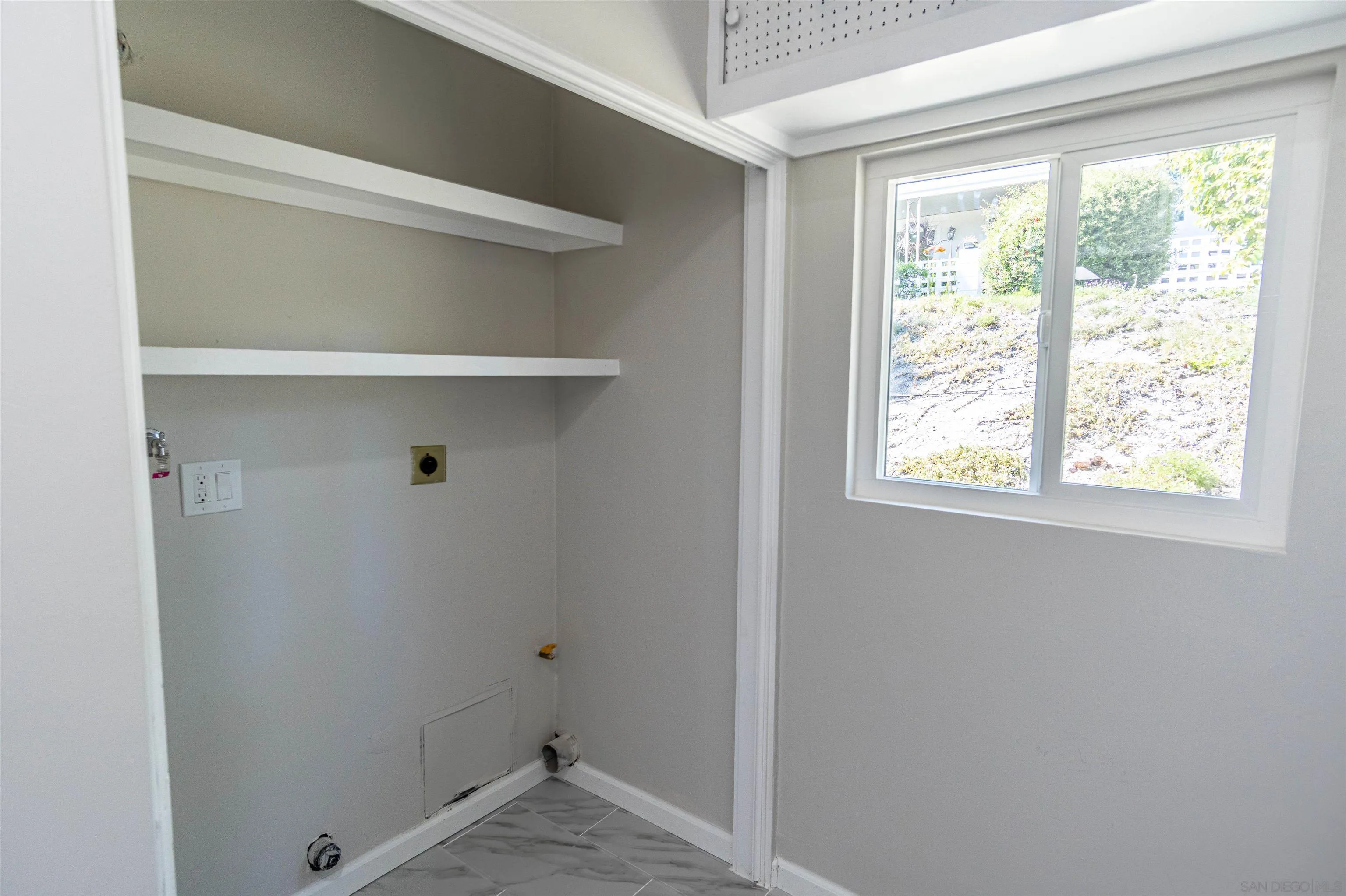 3747 Vista Campana South, Unit 43 Oceanside, CA 92057 - Photo 19 of 30 a view of a room with rack on the wall