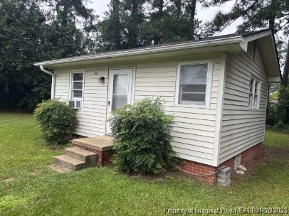 4966 Robin Street Fayetteville, NC 28304 - Photo 1 of 11 a view of a small house with a yard
