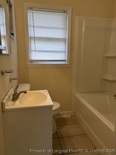 4966 Robin Street Fayetteville, NC 28304 - Photo 11 of 11 a bathroom with a sink and vanity