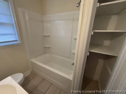 a bathroom with a bathtub