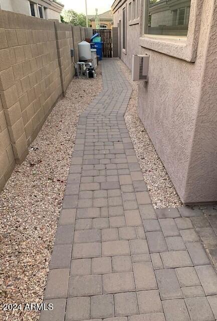 5246 East Estevan Road Phoenix, AZ 85054 - Photo 34 of 40 Paver brick walkway