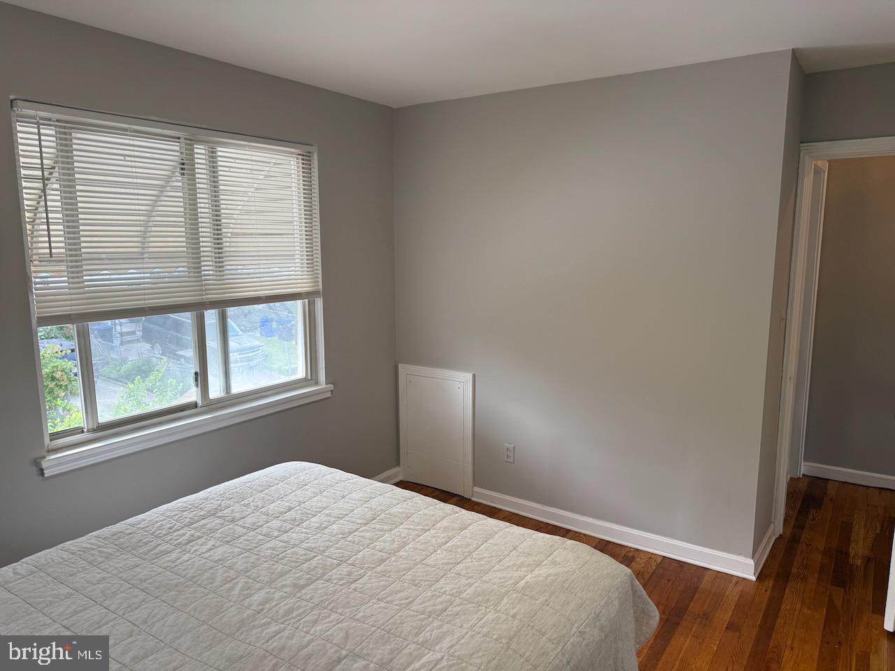 5032 Sargent Road Northeast Washington, DC 20017 - Photo 31 of 40 a bedroom with a bed and a window
