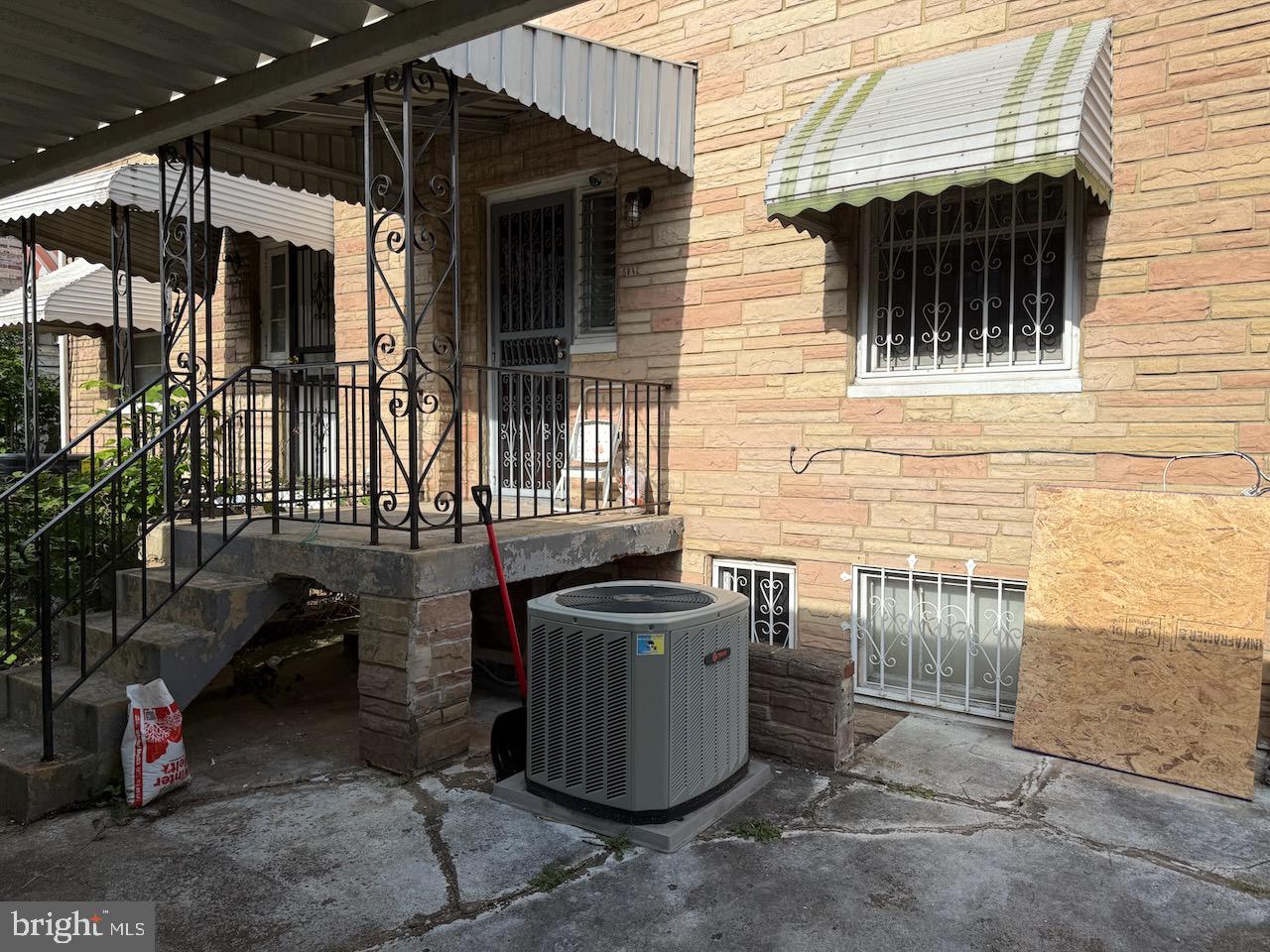 5032 Sargent Road Northeast Washington, DC 20017 - Photo 37 of 40 a view of a patio with table and chairs and potted plants