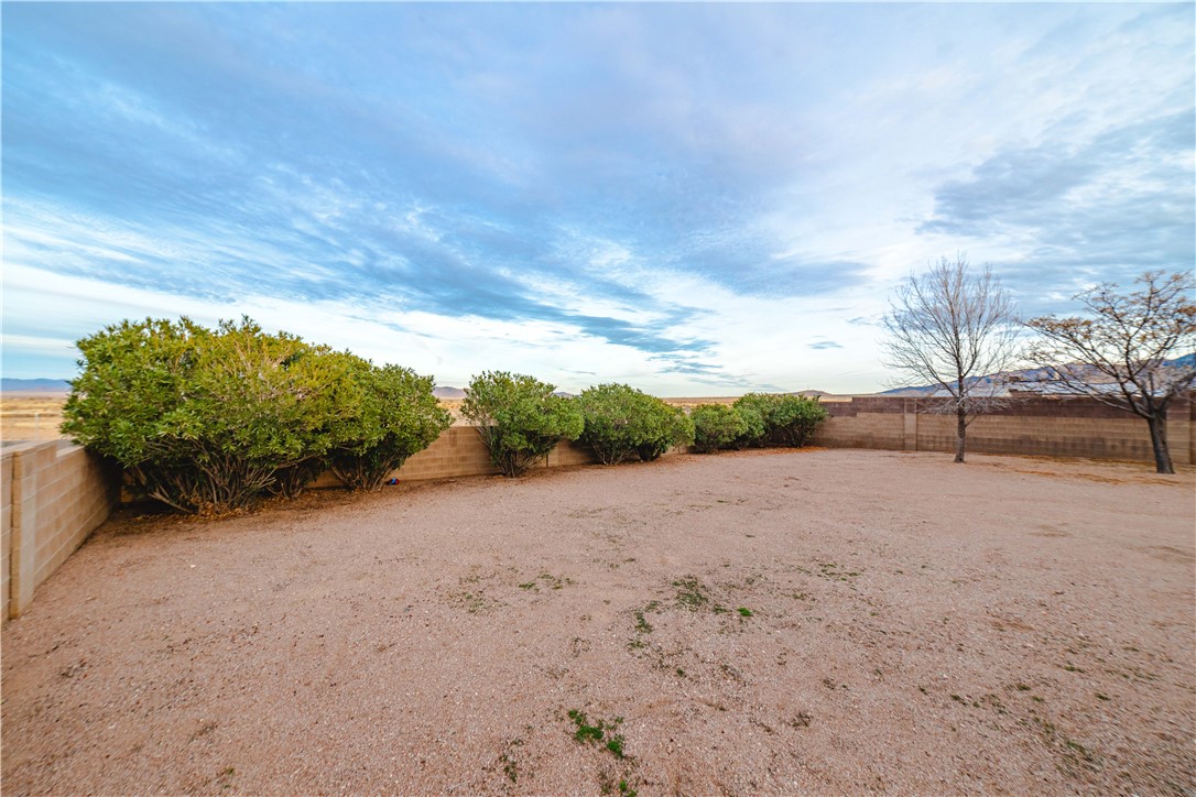 3374 Roma Road Kingman, AZ 86401 - Photo 53 of 64 Fenced backyard with a view of countryside