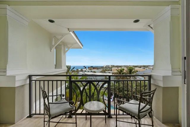 a view of a chairs and table on the terrace