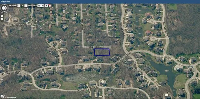 a bathroom with a large window and a white painted wall