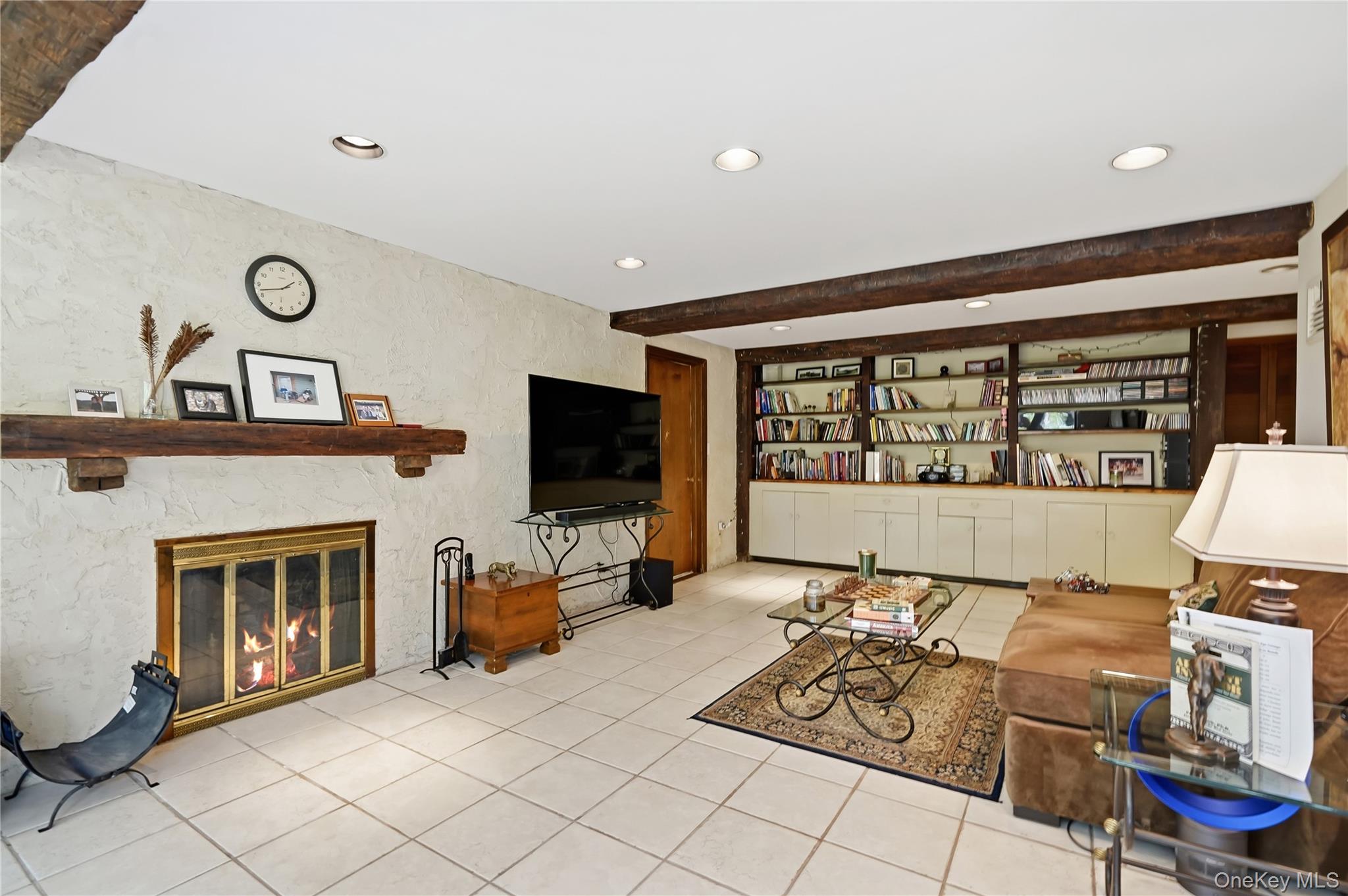 19 Macaulay Road Katonah, NY 10536 - Photo 17 of 19 Walk out lower level with wood burning fireplace