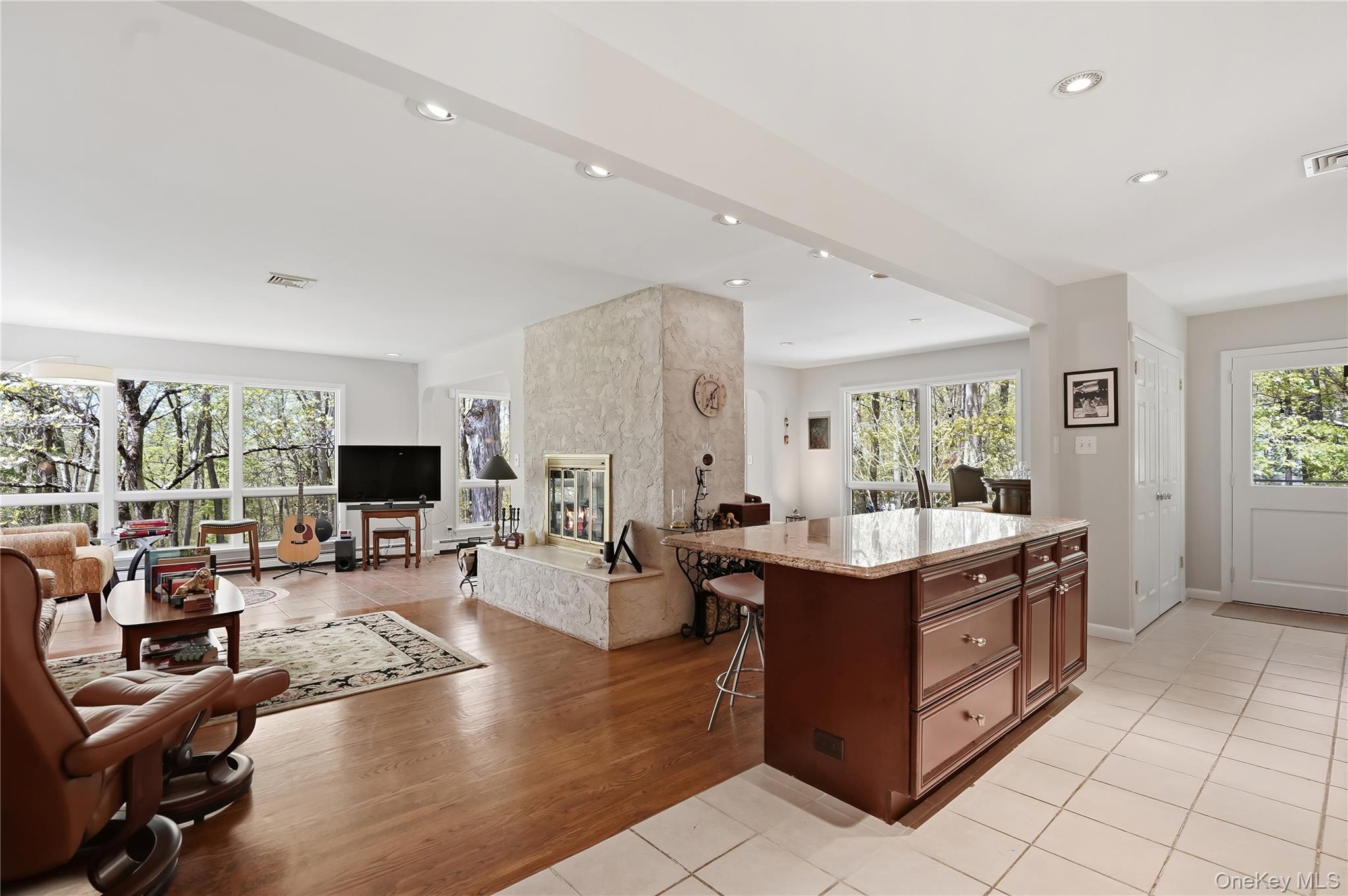 19 Macaulay Road Katonah, NY 10536 - Photo 8 of 19 Open living room with wood burning fireplace