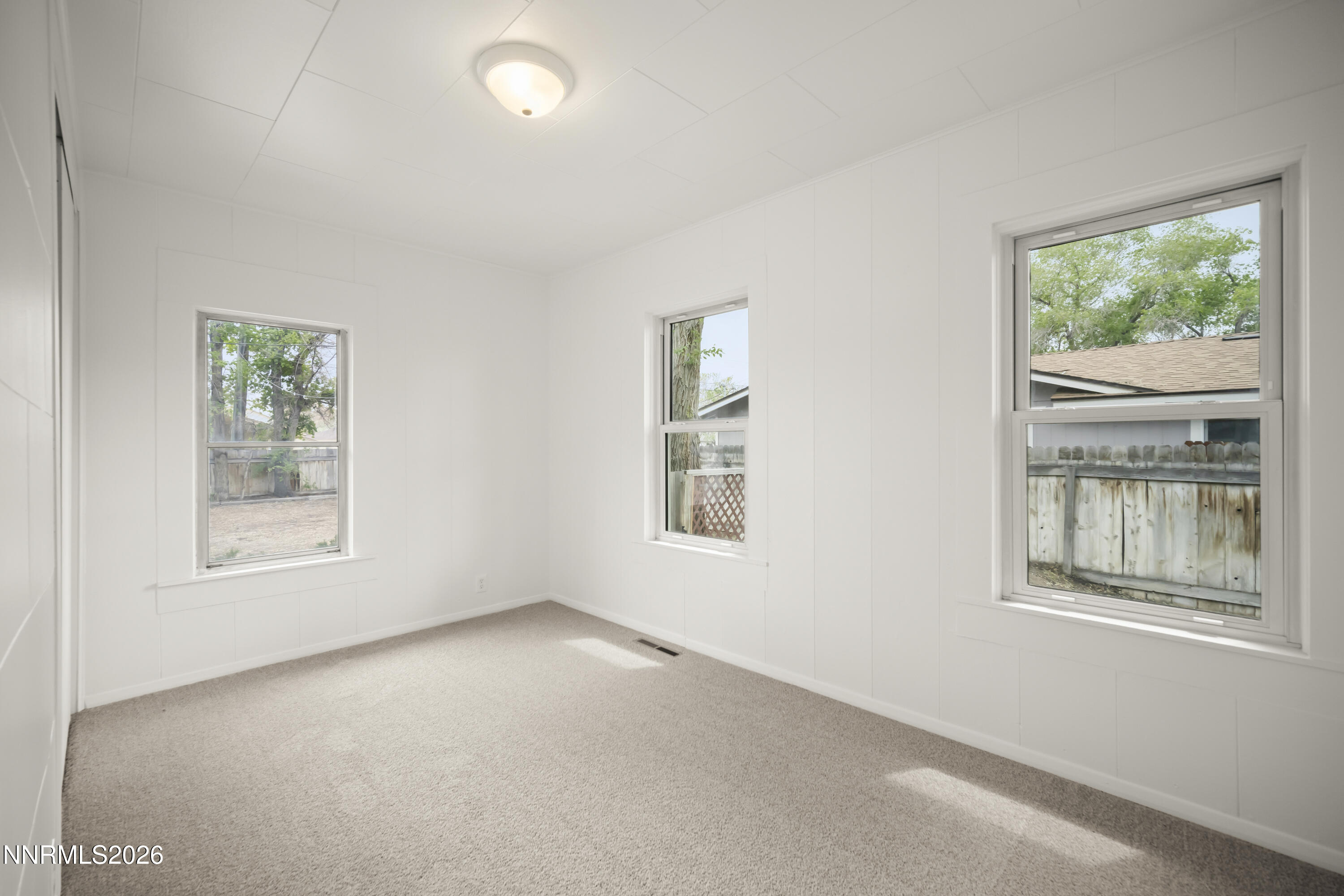511 Churchill Street Fallon, NV 89406 - Photo 16 of 37 an empty room with windows