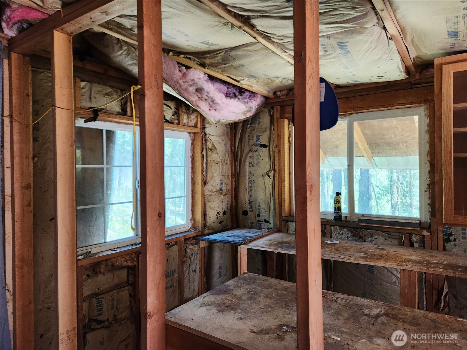 302 Klondike Road Republic, WA 99166 - Photo 6 of 10 a view of a living room with a large window