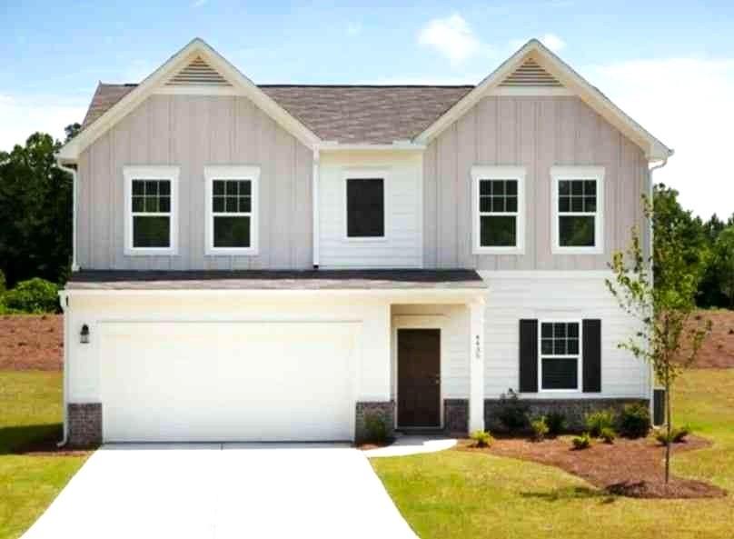 24 Rowlett Place Winder, GA 30680 - Photo 1 of 5 a front view of a house with a yard