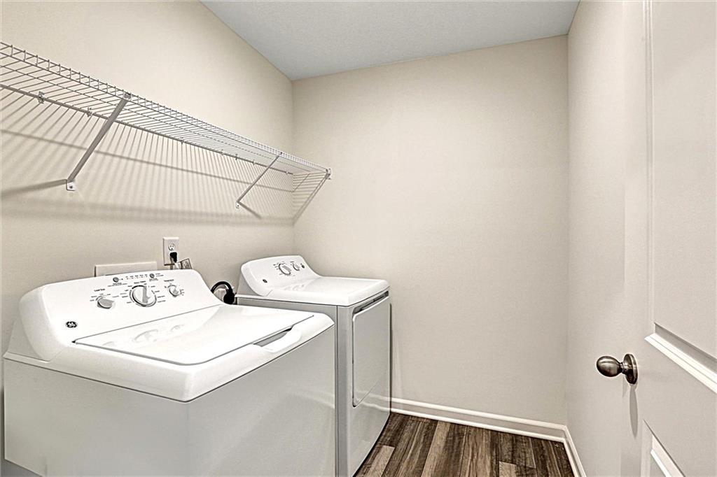 24 Rowlett Place Winder, GA 30680 - Photo 13 of 17 a utility room with dryer and washer