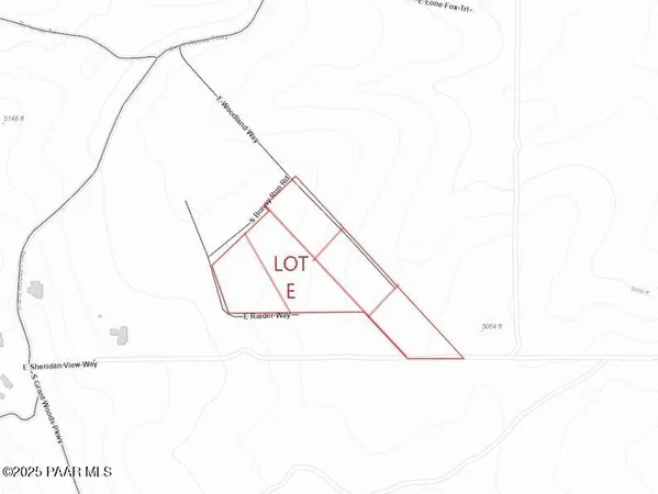 a picture of white wall with a window