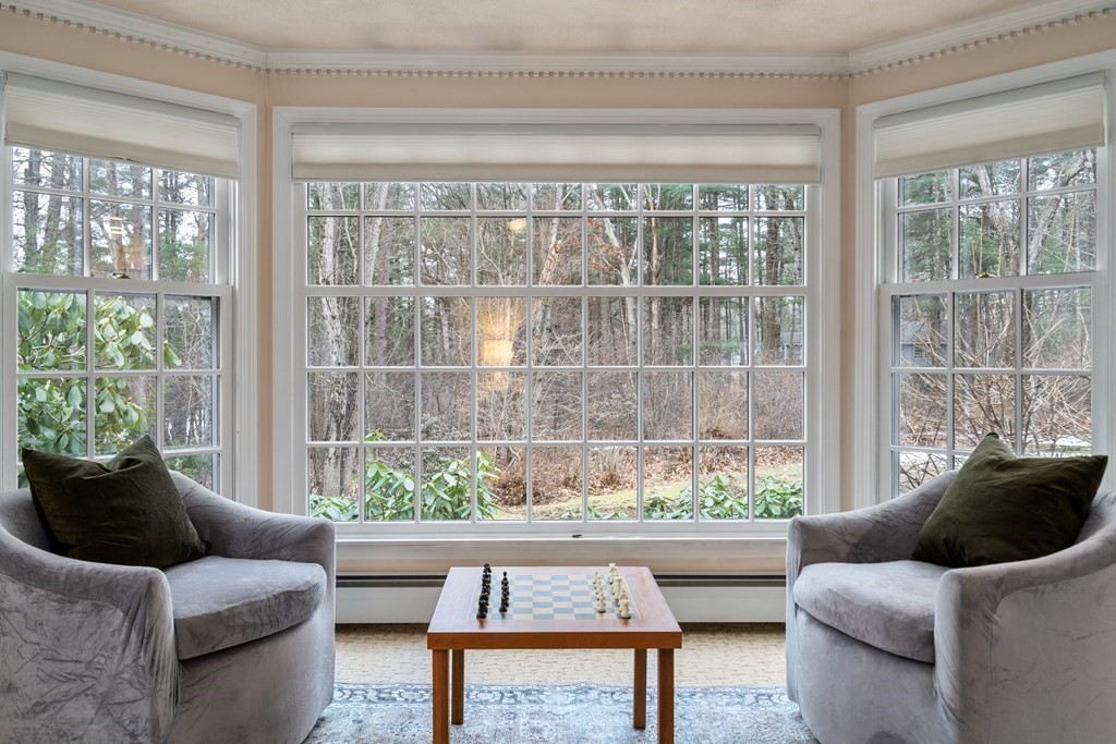 62 Rambling Road Sudbury, MA 01776 - Photo 13 of 38 a living room with furniture and a potted plant