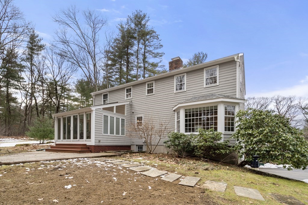 62 Rambling Road Sudbury, MA 01776 - Photo 4 of 38 a front view of a house with garden