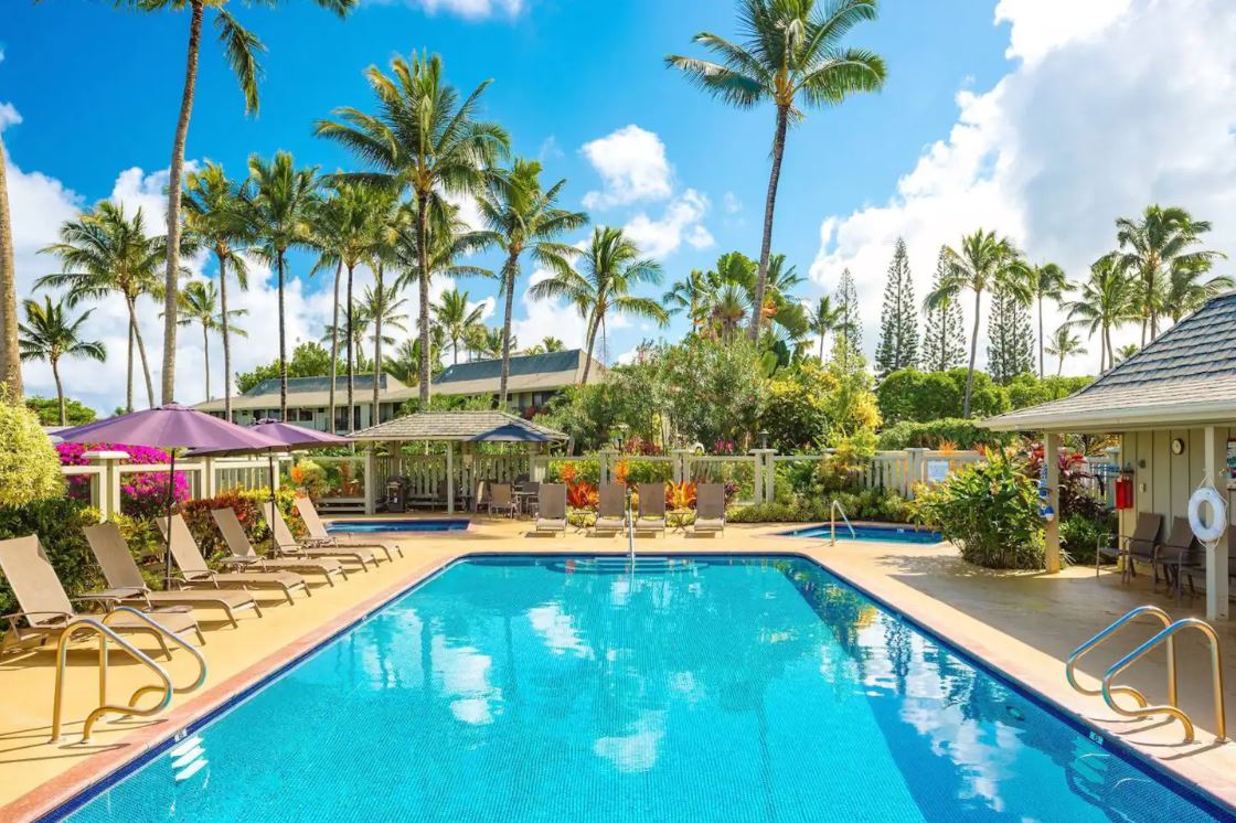 3830 Edward Road, Unit 12D Princeville, HI 96722 - Photo 24 of 30 a view of a swimming pool with a patio
