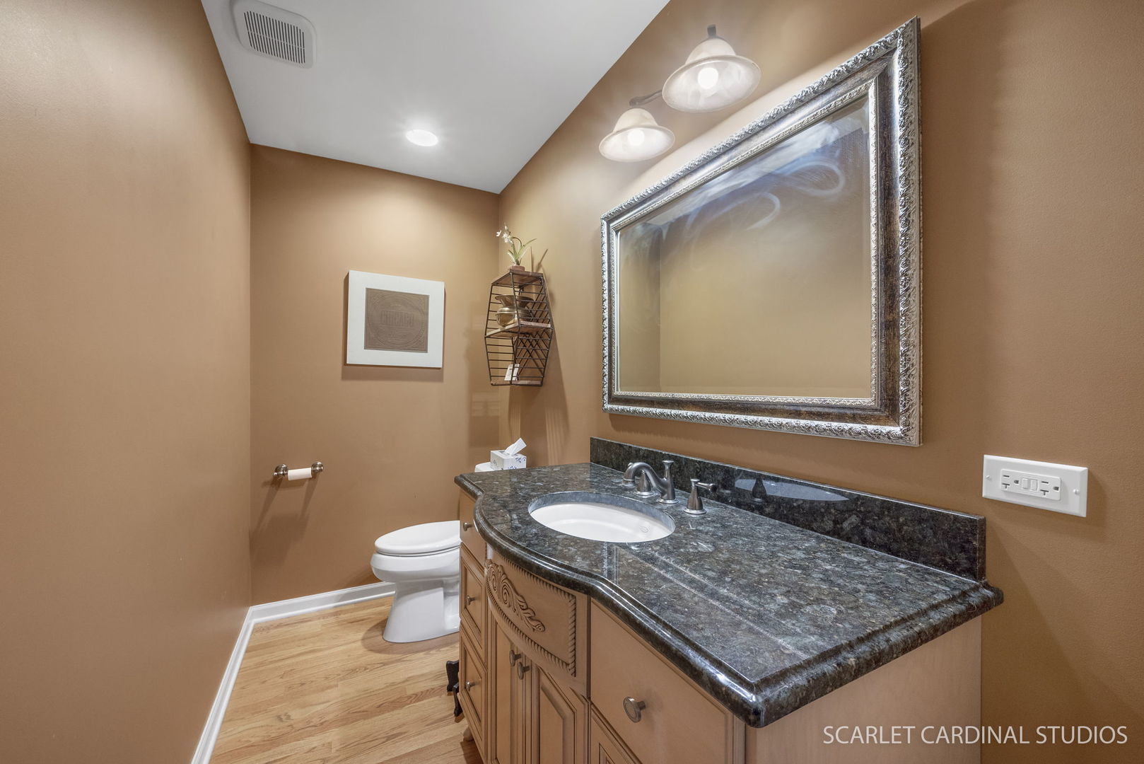 2S560 Seneca Drive Wheaton, IL 60189 - Photo 17 of 33 a bathroom with a granite countertop sink a toilet and mirror