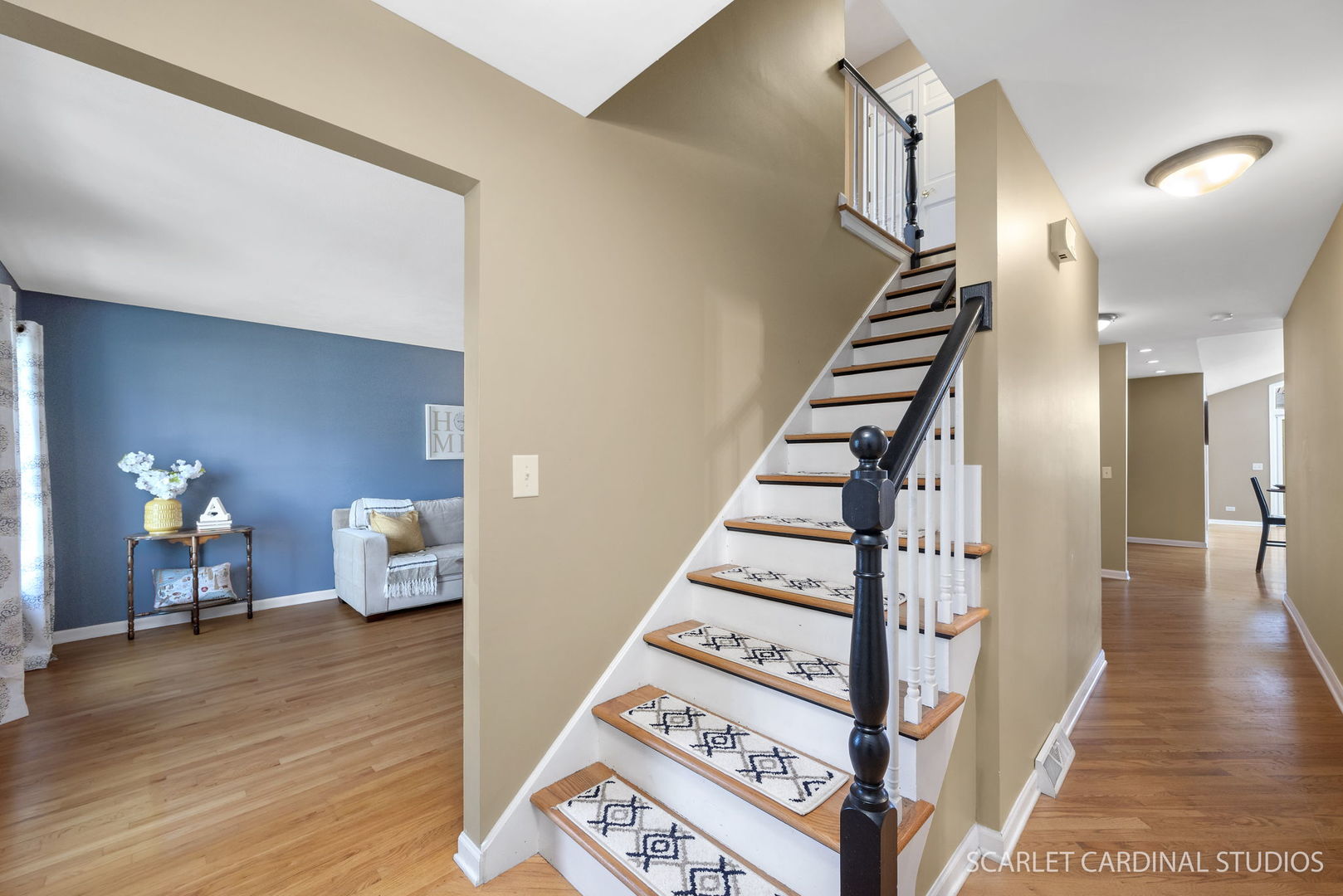 2S560 Seneca Drive Wheaton, IL 60189 - Photo 2 of 33 a view of entryway and hall with wooden floor