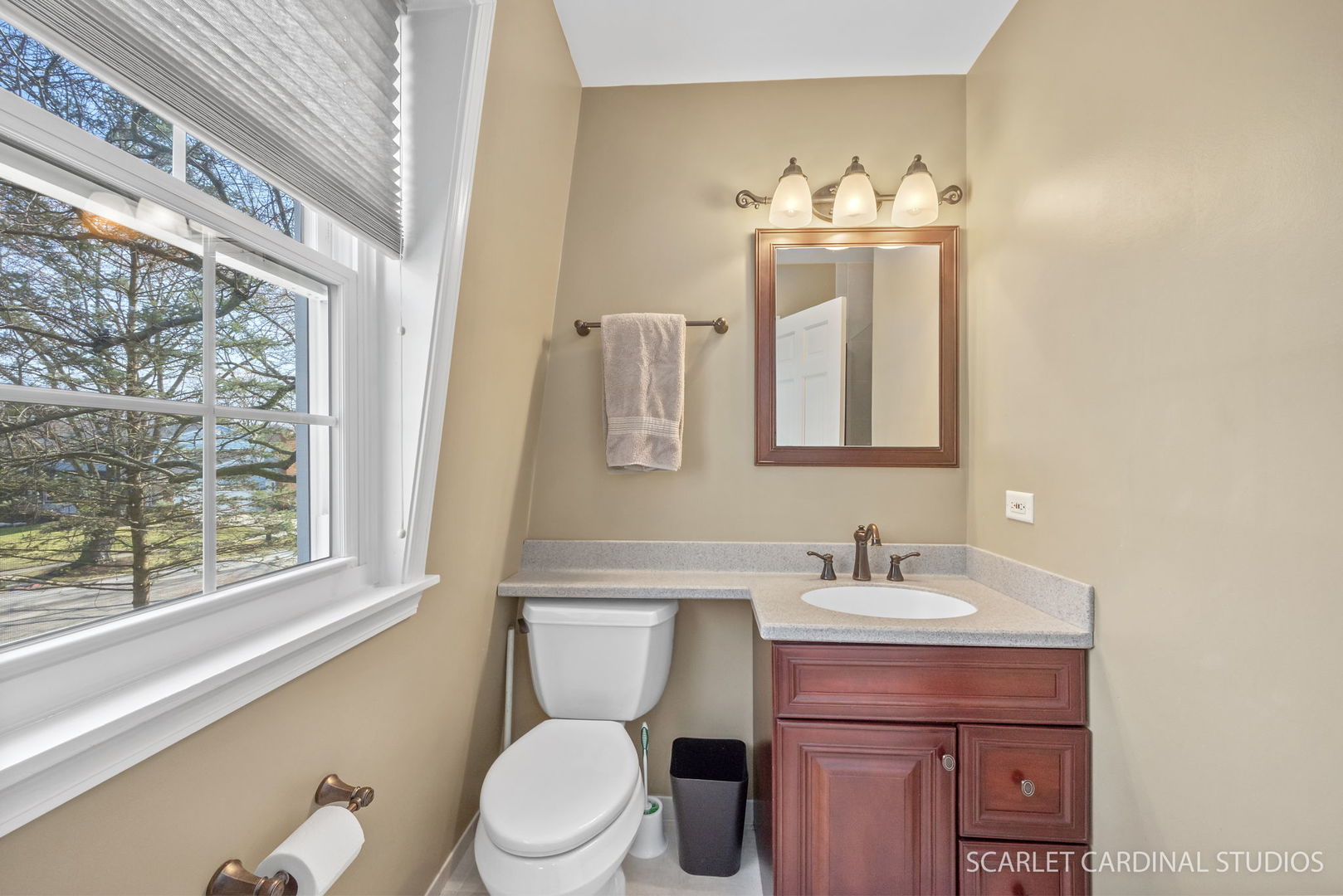 2S560 Seneca Drive Wheaton, IL 60189 - Photo 23 of 33 a bathroom with a toilet sink and mirror