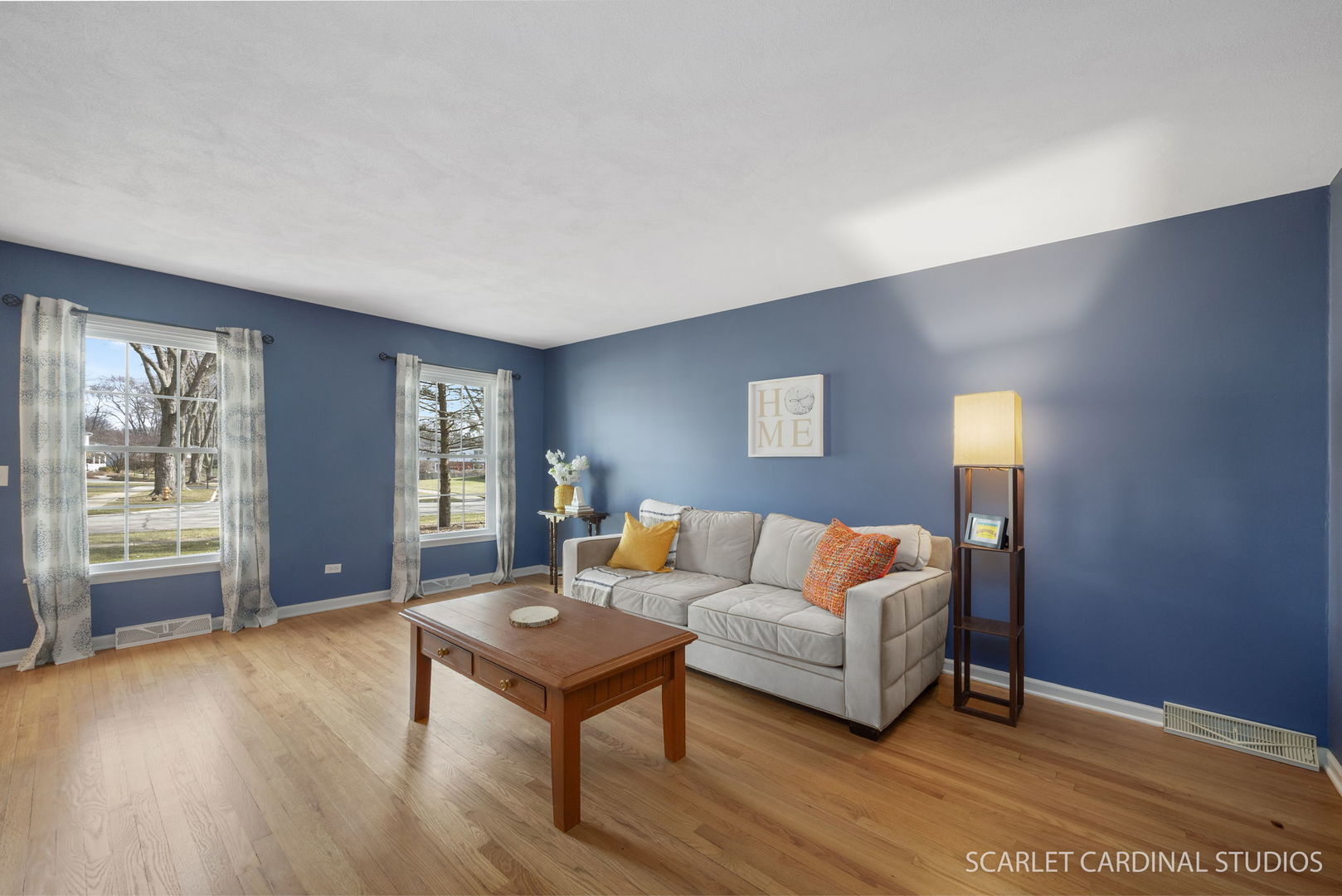 2S560 Seneca Drive Wheaton, IL 60189 - Photo 3 of 33 a living room with furniture and a wooden floor