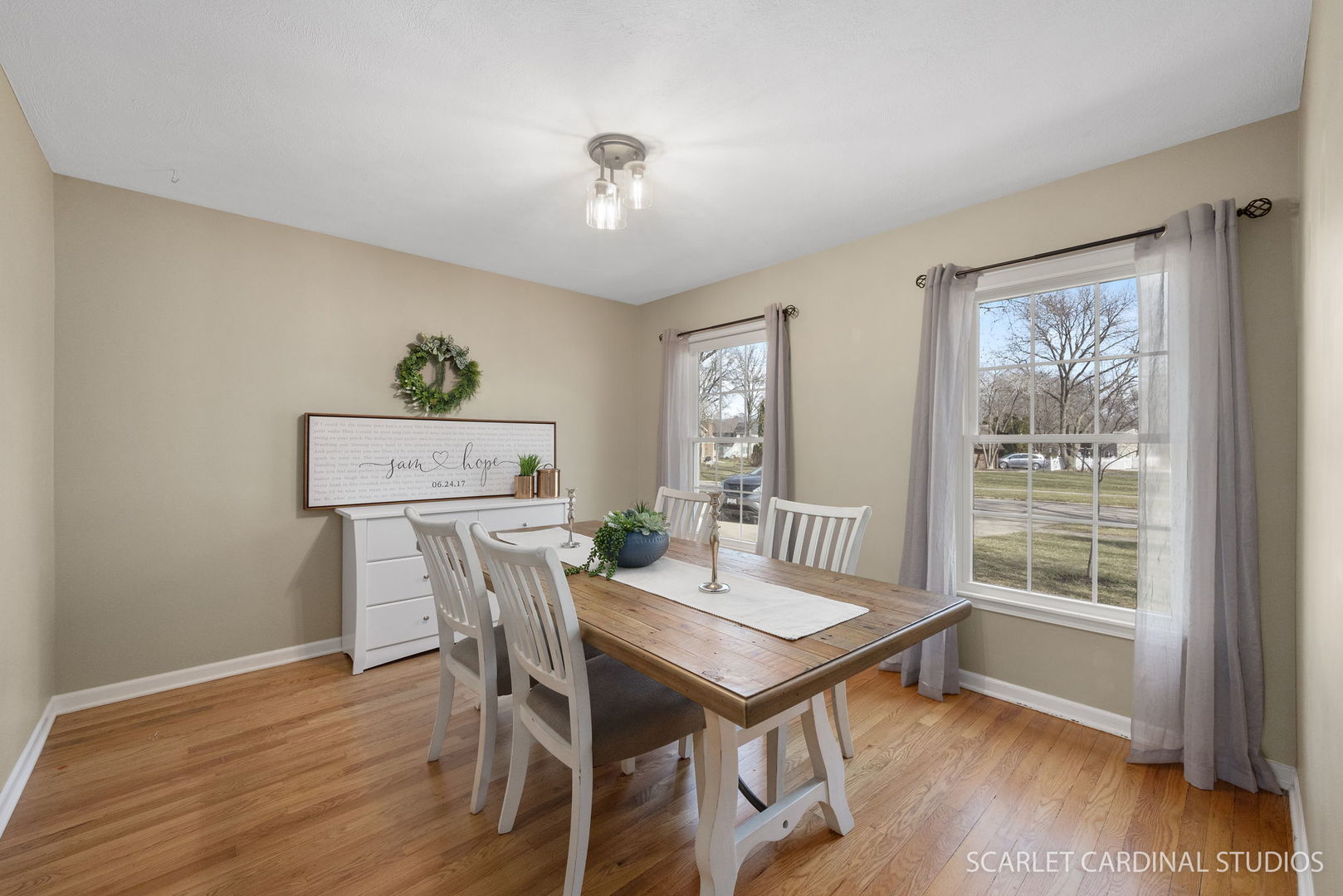 2S560 Seneca Drive Wheaton, IL 60189 - Photo 4 of 33 a view of a dining room with furniture window and wooden floor