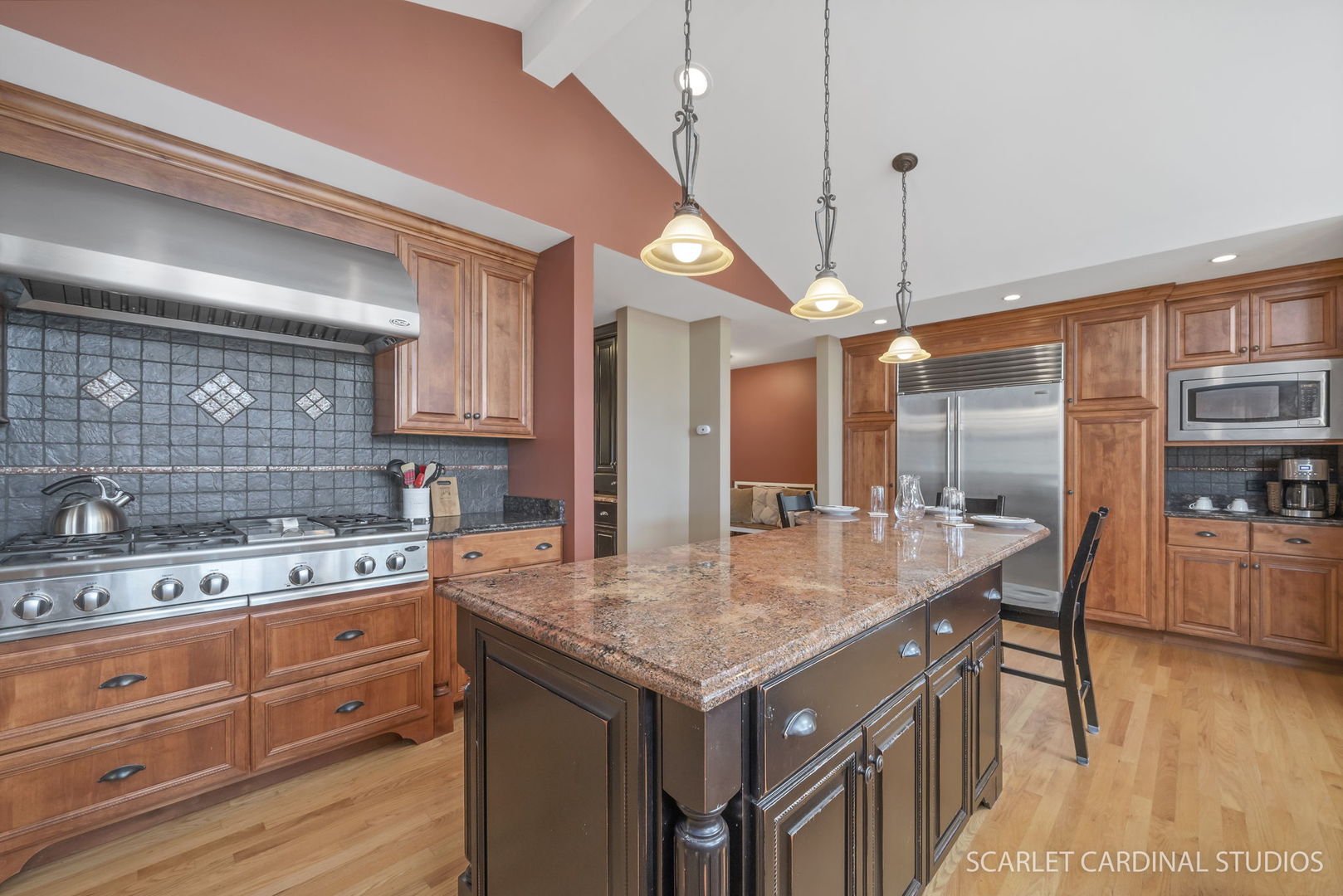 2S560 Seneca Drive Wheaton, IL 60189 - Photo 7 of 33 a kitchen with a stove a sink a kitchen island with wooden cabinets and floor
