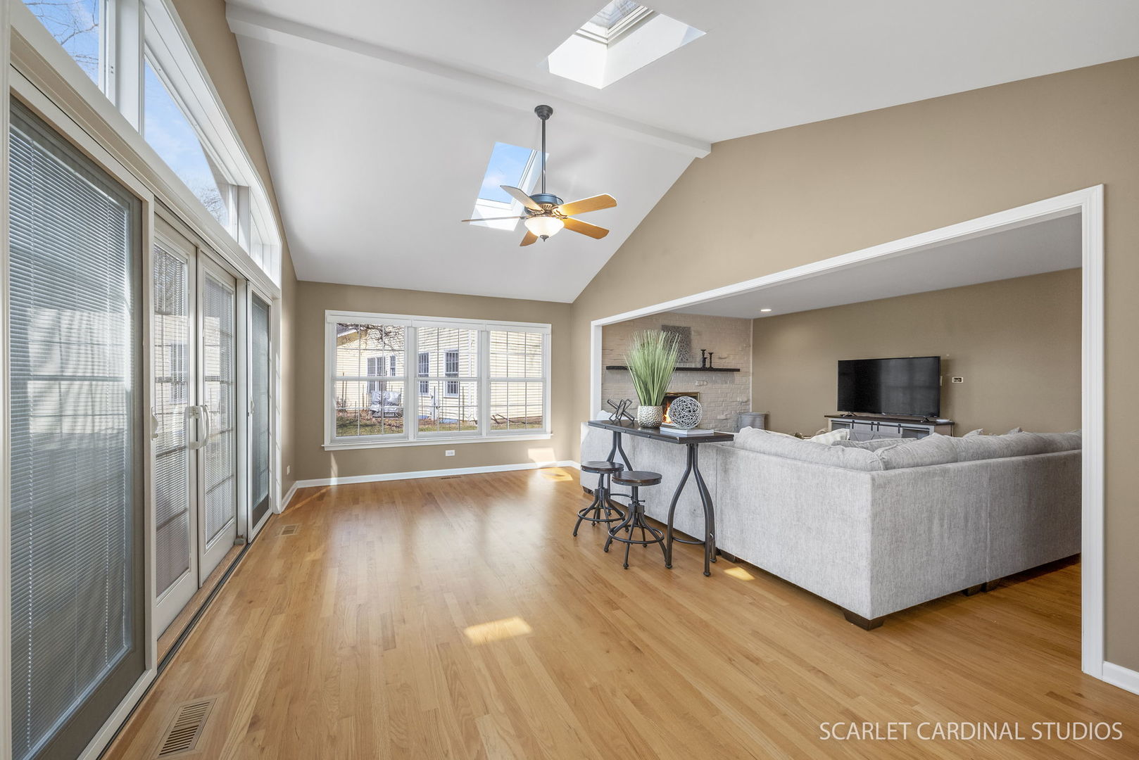 2S560 Seneca Drive Wheaton, IL 60189 - Photo 9 of 33 a living room with furniture and a flat screen tv