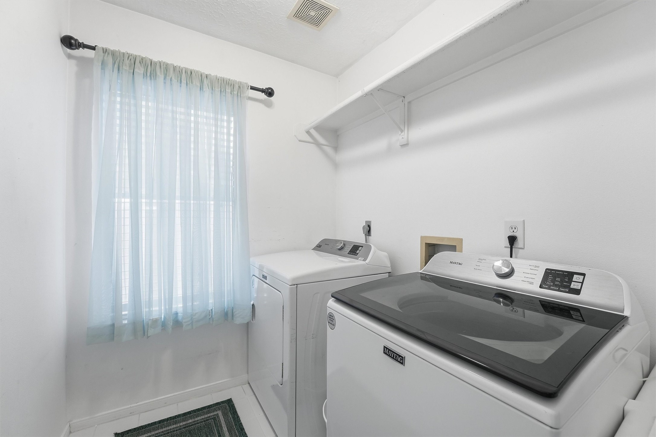 8827 Mile Run Road Humble, TX 77346 - Photo 25 of 37 a utility room with dryer and washer