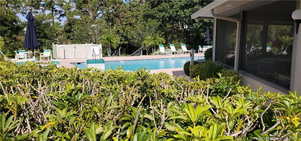 8227 Southeast Croft Circle Hobe Sound, FL 33455 - Photo 15 of 18 a view of a garden