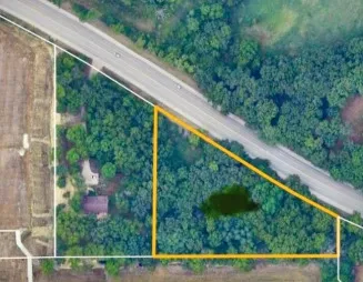 a view of a yard from a balcony