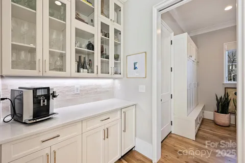 a kitchen with a sink and cabinets