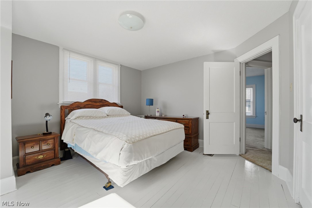 4422 State Road Ashtabula, OH 44004 - Photo 14 of 21 Bedroom with light wood-style floors and baseboards
