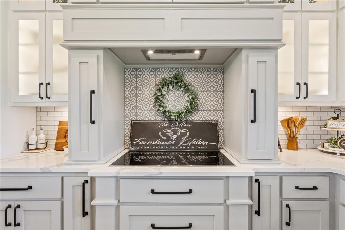 710 Lcr 800 Groesbeck, TX 76642 - Photo 19 of 47 a kitchen with a stove and a white cabinets