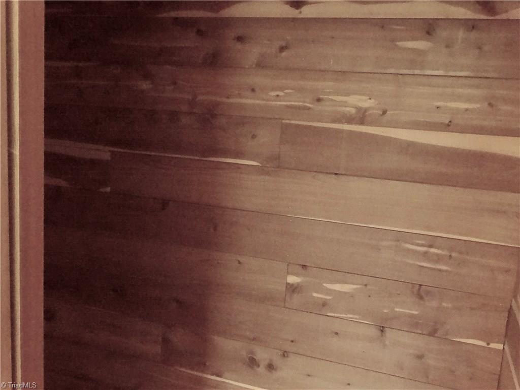 5044 Sitka Road Walkertown, NC 27051 - Photo 11 of 15 There are two cedar lined closets in this home for your clothes storage!
