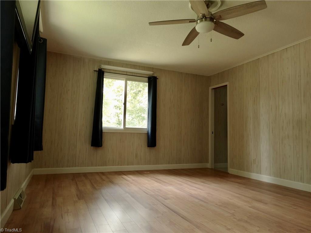 5044 Sitka Road Walkertown, NC 27051 - Photo 14 of 15 Large Master Bedroom with large windows for great light! This easily holds a king size bed with dressers!