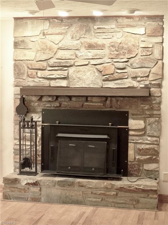 5044 Sitka Road Walkertown, NC 27051 - Photo 9 of 15 Imagine decorating this beautiful stone fireplace with holiday decorations!