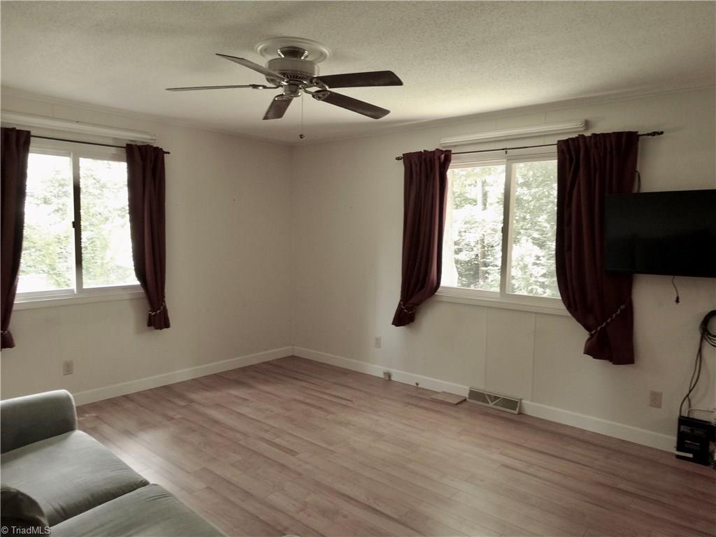 5044 Sitka Road Walkertown, NC 27051 - Photo 10 of 15 Guest room is spacious and has a cedar lined closet!
