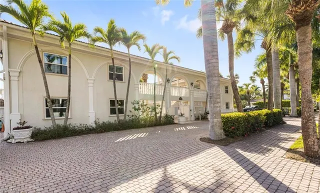 a view of a two chairs in the patio
