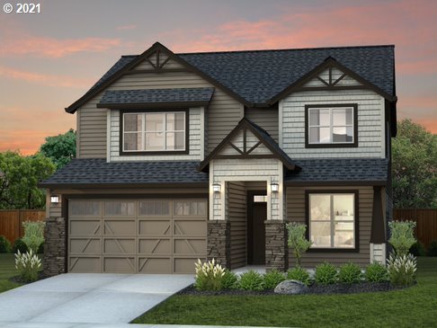 4814 South 12th Circle Ridgefield, WA 98642 - Photo 1 of 1 a front view of a house with a yard and garage