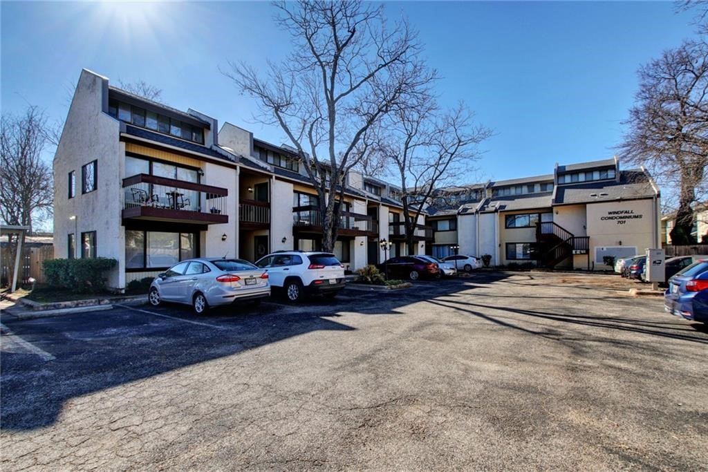 701 Nelray Boulevard, Unit 6 Austin, TX 78751 - Photo 1 of 1 a car parked in front of a building