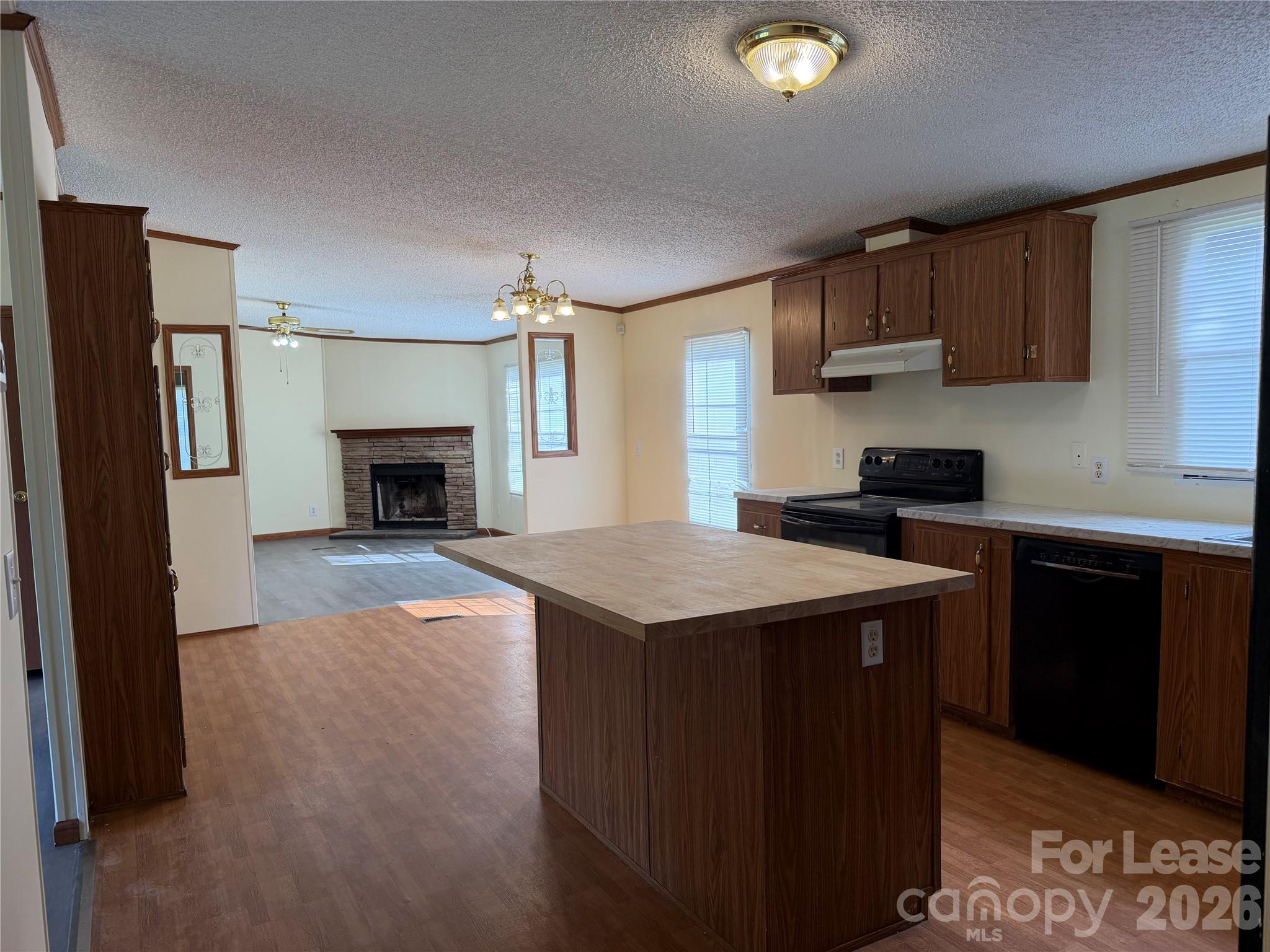 7141 Lingerfelt Road Vale, NC 28168 - Photo 8 of 25 a kitchen with a stove a refrigerator and a sink
