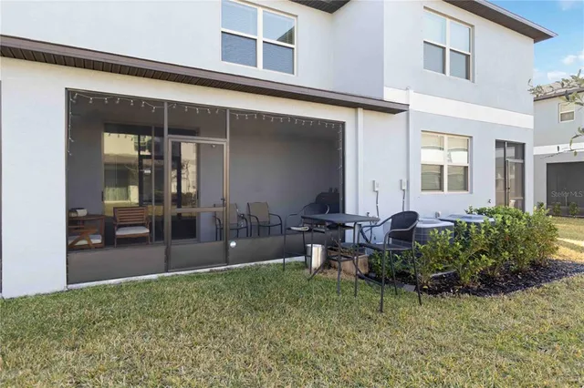 a view of a house with patio