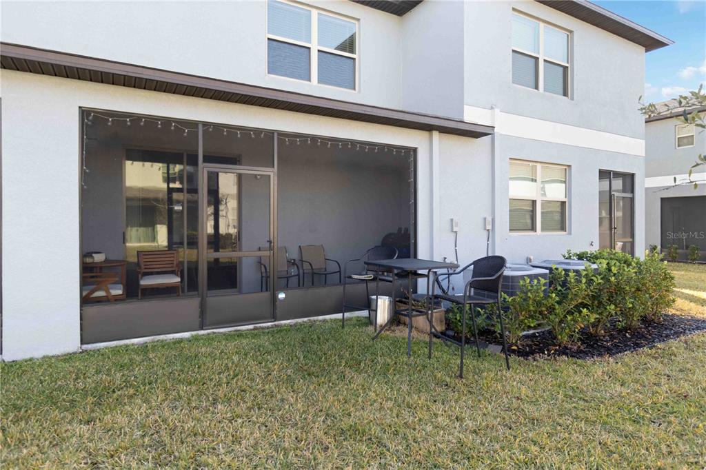 14339 Easy Goer Street Ruskin, FL 33573 - Photo 21 of 49 a view of a house with patio