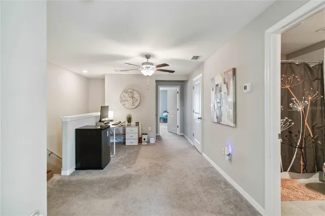 a bathroom with a granite countertop sink toilet and a shower
