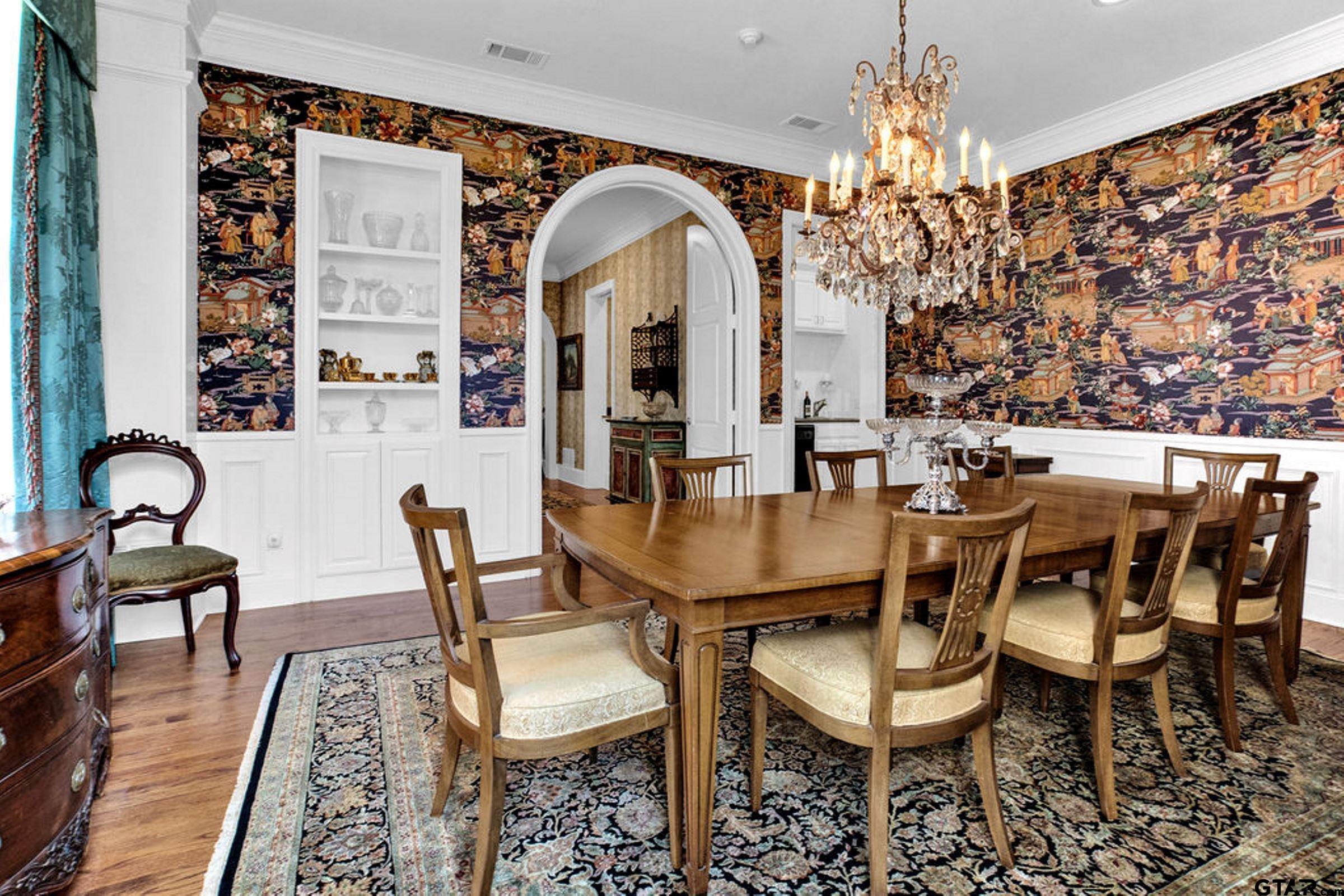 408 East Jolly Street Palestine, TX 75801 - Photo 13 of 48 a view of a dining room with furniture and chandelier